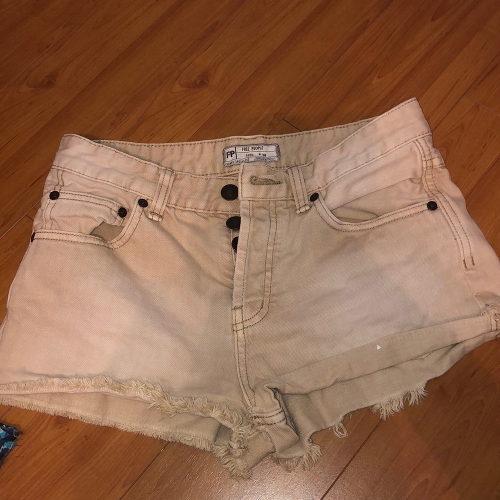 Free People beige shorts.